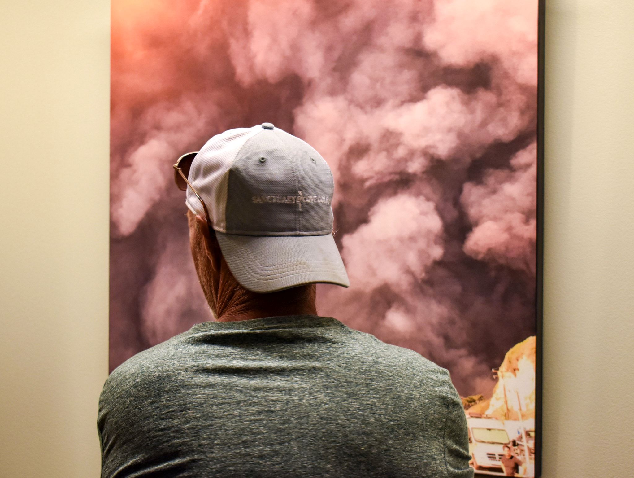 Patron looking at artwork